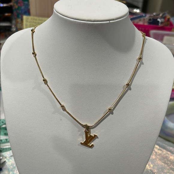 Upcycled Jewelry - 1407. Elegant LV zipper pull / charm on a 18k gold plated necklace.